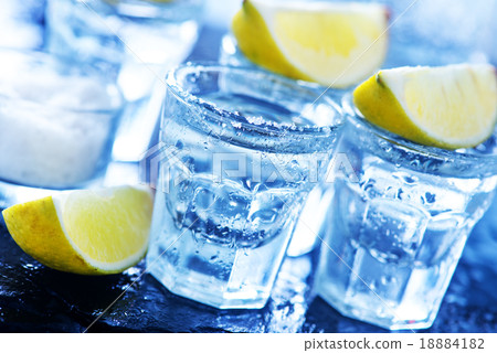 tequilla with limes tequilla with limes 18884182