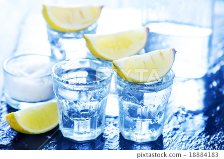 tequilla with limes tequilla with limes 18884183