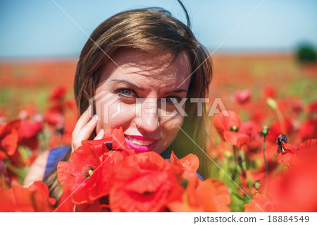 Girl with poppies Girl with poppies 18884549