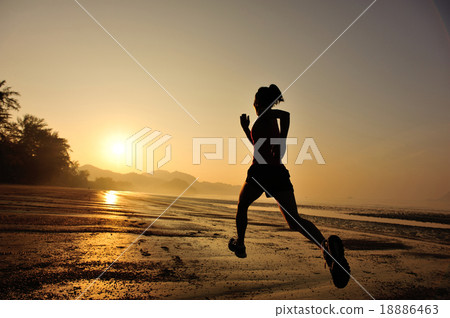 young fitness woman running at sunrise beach young fitness woman running at sunrise beach 18886463