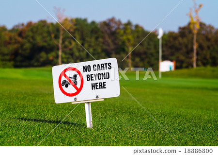 golf signs on grass 18886800