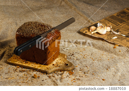 Healthy food: sliced brown bread Healthy food: sliced brown bread 18887010