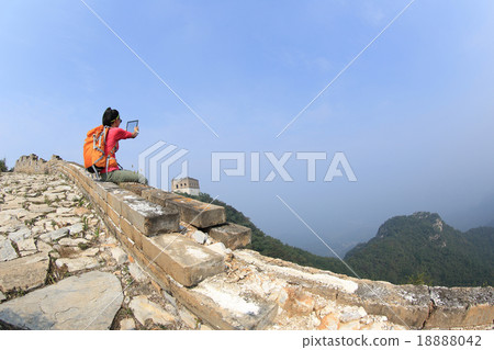 young woman hiker use digital tablet   18888042
