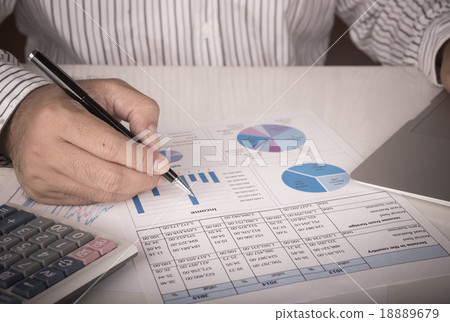businessman analyzing data report 18889679