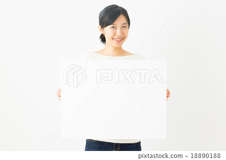 A woman with a white board A woman with a white board 18890188