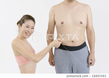 A slim young lady picking the fat meat's stomach meat 18891481