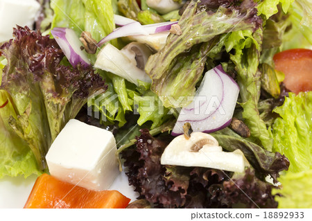Greek salad on a white background in the restauran 18892933