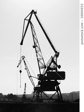 Silhouettes of industrial port cranes 18894833
