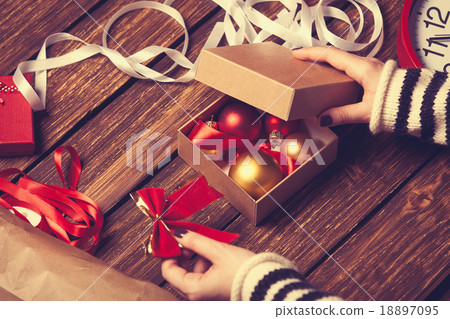 Female hands and christmas gift box 18897095