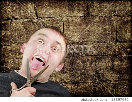 Mad man with scissors cuts off itself tongue 18897681