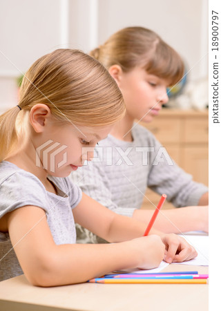 Pleasant little girl drawing Pleasant little girl drawing 18900797