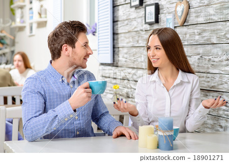 Happy friends sitting in the cafe Happy friends sitting in the cafe 18901271