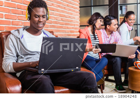 Computer programmer in start-up company coding Computer programmer in start-up company coding 18904248