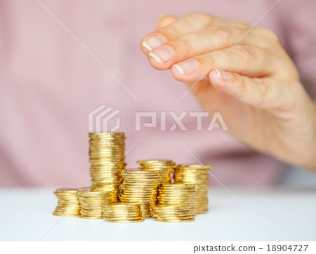 Protect new business start-up  - with hands and coin 18904727