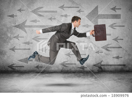 Businessman runnung fast, side view 18909976