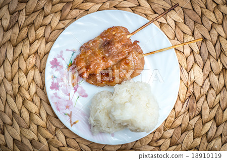 Grilled chicken and sticky rice, Thai street food. 18910119