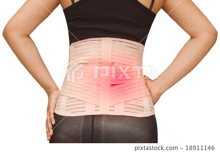 Woman in back injury wearing lumbar brace corset Woman in back injury wearing lumbar brace corset 18911146