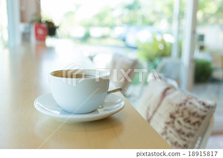 hot of coffee drink on wooden table bar 18915817