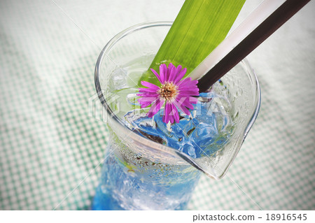Blue hawaii italian soda decorated with flower 18916545