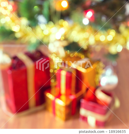 blur light celebration on christmas tree with gift blur light celebration on christmas tree with gift 18916635