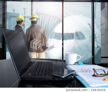 Office workplace with laptop and smart phone  18916839