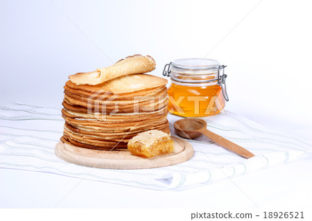 isolated pancakes and honey 18926521