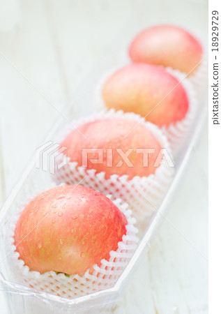 Red Apples on white wooden table 18929729