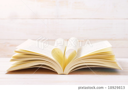 Open Book with heart shape in the middle page Open Book with heart shape in the middle page 18929813