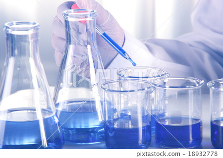 Flask in scientist hand 18932778