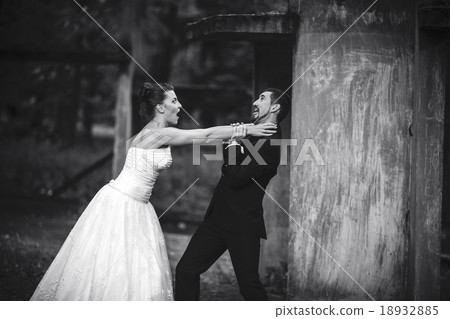bride and groom having fun bride and groom having fun 18932885