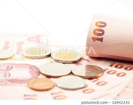 Rolled banknotes on pile of money 18942242