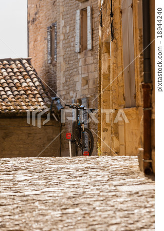 Bicycle on a street of an old town in the Europe Bicycle on a street of an old town in the Europe 18944240
