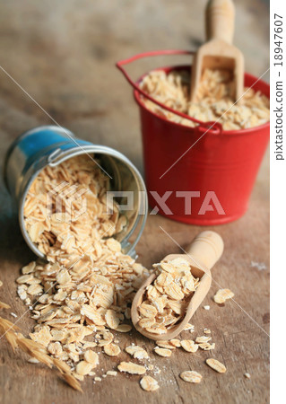 oat flakes on wood 18947607