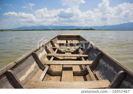 Rowboat in the lake and blue sky. 18952467