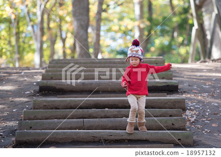 A girl walking on the stairs in the forest 18957132