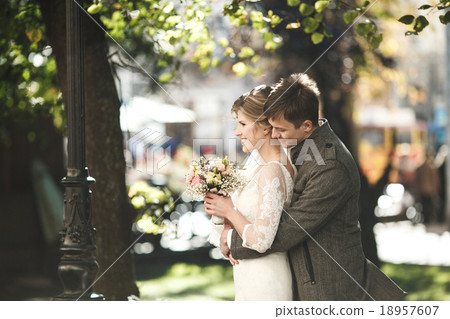 Groom hugs bride Groom hugs bride 18957607