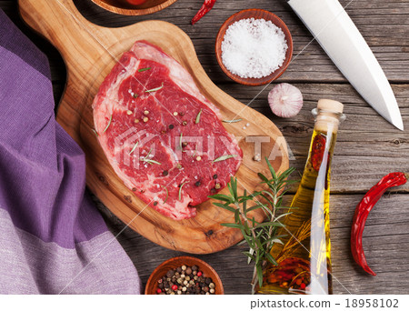 Raw beef steak and spices 18958102