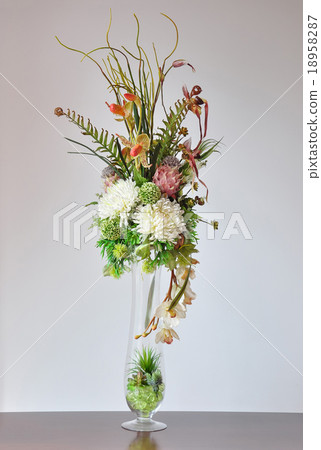 Vases artificial flowers on the desk. Vases artificial flowers on the desk. 18958287