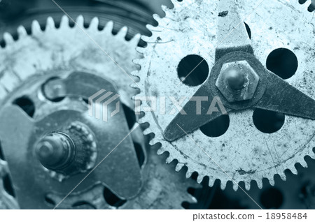 Gearwheels inside clock mechanism. Macro 18958484