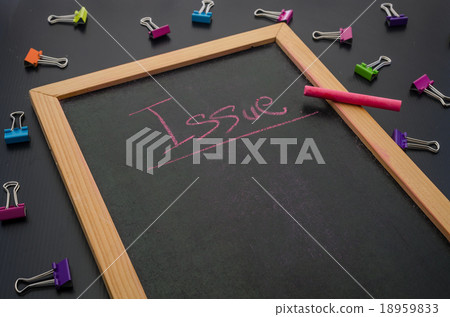 Hand writing with a colorful chalk on blackboard 18959833