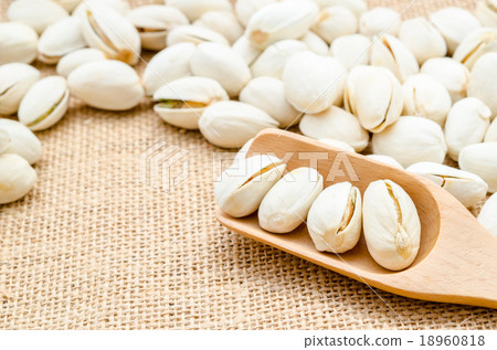 Pistachio in wooden spoon. Pistachio in wooden spoon. 18960818