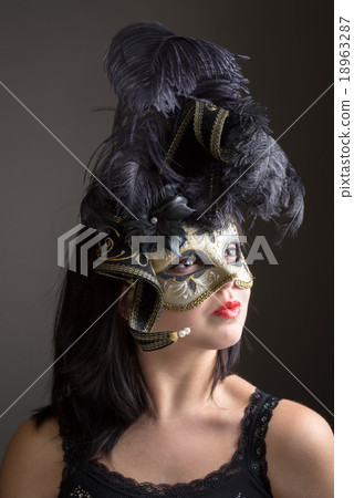 portrait of young girl in black venetian mask. portrait of young girl in black venetian mask. 18963287