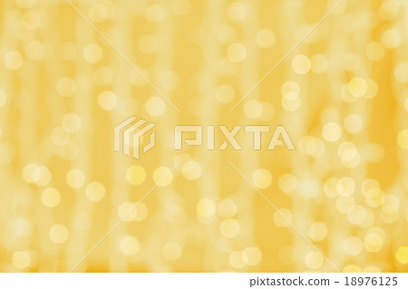 blurred golden background with bokeh lights blurred golden background with bokeh lights 18976125