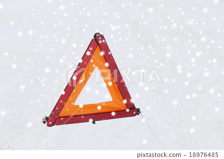 closeup of warning triangle on snow 18976485