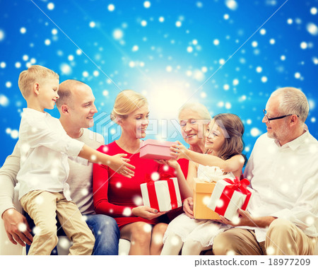 smiling family with gifts smiling family with gifts 18977209