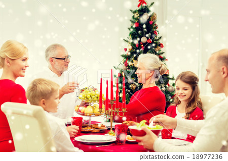 smiling family having holiday dinner at home smiling family having holiday dinner at home 18977236