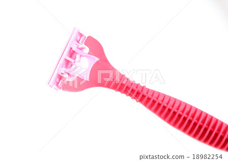 Safety pink plastic razor isolated on white. 18982254