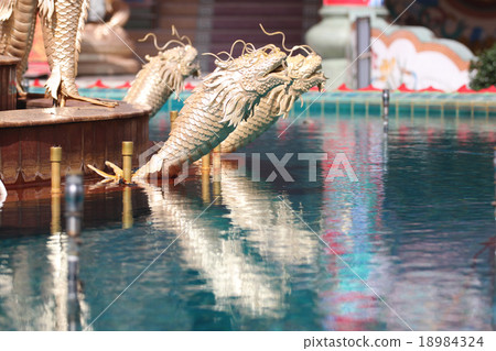 Gold fish statue of architecture in a Chinese temple. Gold fish statue of architecture in a Chinese temple. 18984324