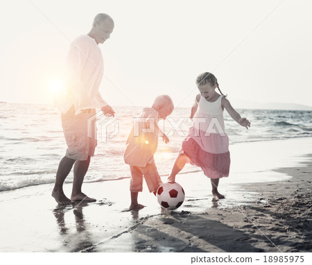 Family Beach Football Holiday Soccer Togetherness Concept 18985975