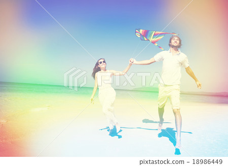 Couple Beach Kite Flying Getaway Holiday Concept Couple Beach Kite Flying Getaway Holiday Concept 18986449
